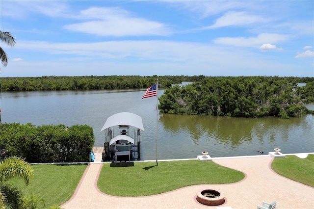 24197 Treasure Island Blvd, Punta Gorda, FL 33955 - dock with a water view, a yard, and boat lift