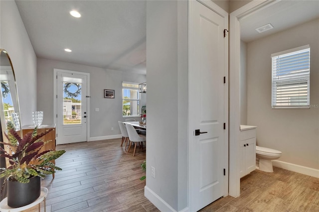 72031/2 S W Shore Blvd, Tampa, FL 33616 - foyer featuring light wood-style floors, baseboards, and recessed lighting