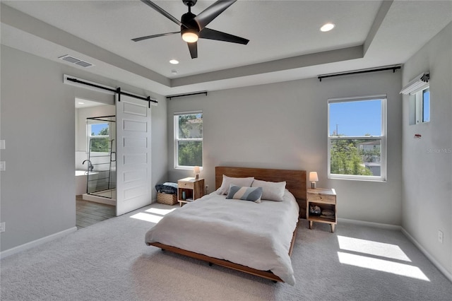 72031/2 S W Shore Blvd, Tampa, FL 33616 - carpeted bedroom with a barn door, baseboards, recessed lighting, ensuite bathroom, and a ceiling fan