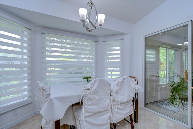 1210 Wolford Dr, Trinity, FL 34655 - dining space featuring plenty of natural light and a chandelier