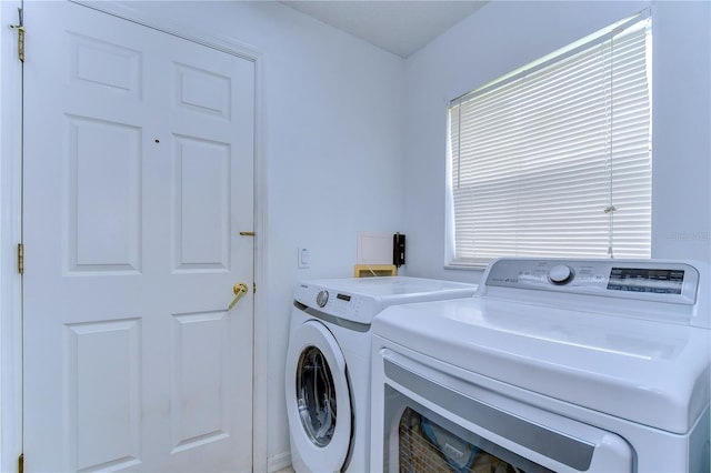 1210 Wolford Dr, Trinity, FL 34655 - laundry area with separate washer and dryer