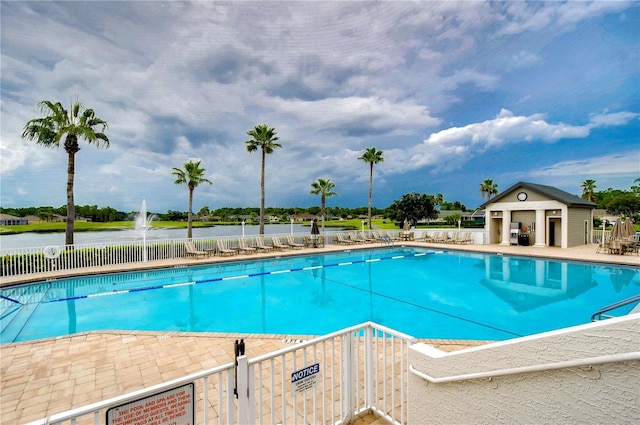 1210 Wolford Dr, Trinity, FL 34655 - community pool featuring a patio area