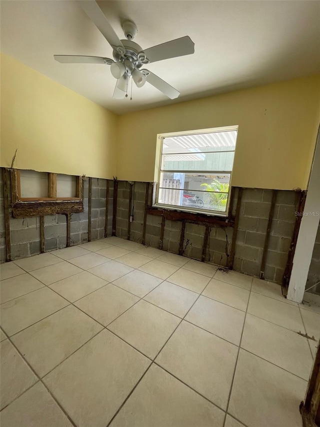 3207 S De Bazan Ave, St Pete Beach, FL 33706 - empty room featuring tile patterned flooring and ceiling fan