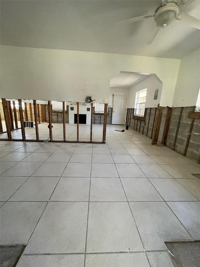 3207 S De Bazan Ave, St Pete Beach, FL 33706 - bonus room featuring a ceiling fan and light tile patterned floors