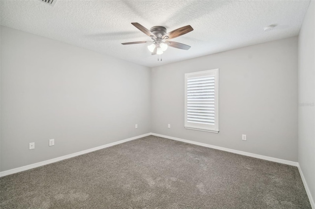 13227 Quigley Ave, Weeki Wachee, FL 34614 - spare room featuring ceiling fan, carpet flooring, baseboards, a textured ceiling, and a smoke detector