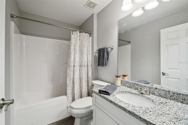 13227 Quigley Ave, Weeki Wachee, FL 34614 - full bathroom featuring vanity, shower / bathtub combination with curtain, toilet, a textured ceiling, and wood finished floors