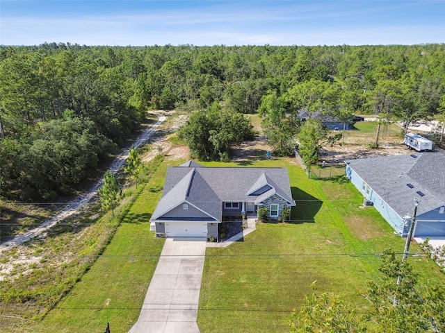 13227 Quigley Ave, Weeki Wachee, FL 34614 - view from above of property featuring a heavily wooded area