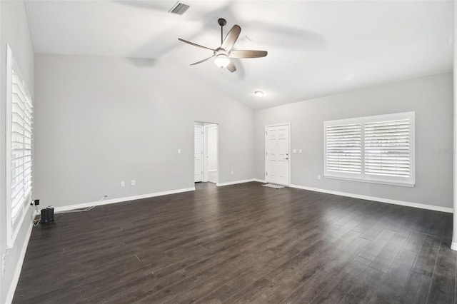 13227 Quigley Ave, Weeki Wachee, FL 34614 - unfurnished living room with ceiling fan, dark wood-style flooring, vaulted ceiling, and baseboards