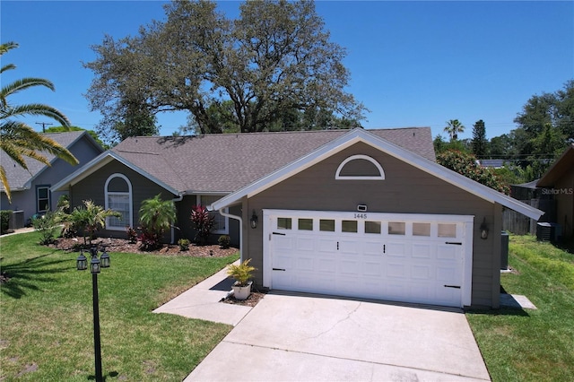 1445 Stonehenge Way, Palm Harbor, FL 34683 - view of front of home with concrete driveway, a front yard, cooling unit, and an attached garage