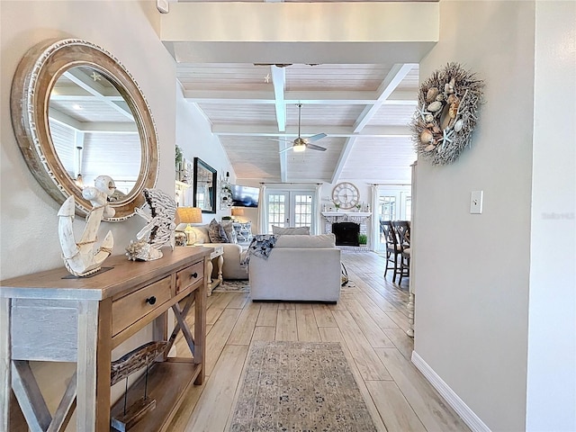 1445 Stonehenge Way, Palm Harbor, FL 34683 - corridor with beam ceiling, light wood-style floors, and baseboards