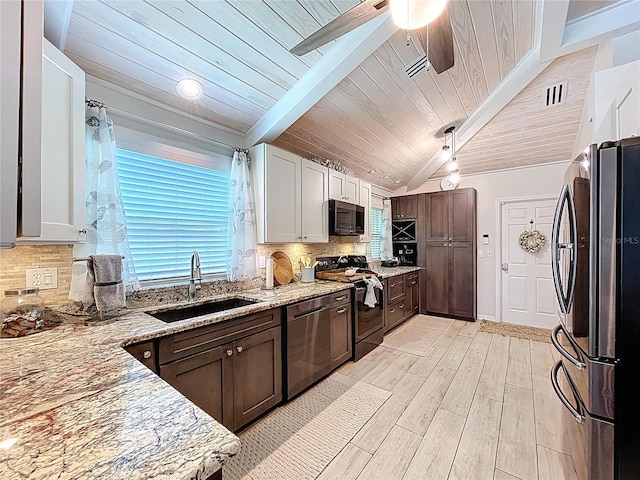 1445 Stonehenge Way, Palm Harbor, FL 34683 - kitchen featuring appliances with stainless steel finishes, a sink, light stone counters, decorative backsplash, and wooden ceiling
