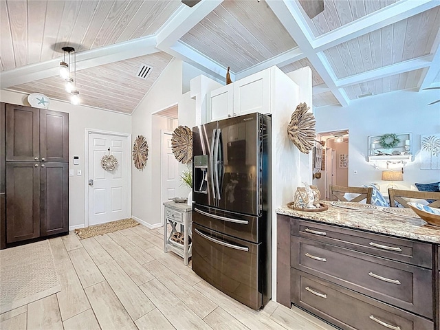 1445 Stonehenge Way, Palm Harbor, FL 34683 - kitchen with fridge with ice dispenser, dark brown cabinetry, light wood-type flooring, light stone counters, and wooden ceiling with exposed beams