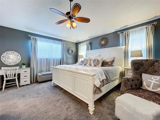 1445 Stonehenge Way, Palm Harbor, FL 34683 - bedroom featuring carpet, a textured ceiling, and a ceiling fan