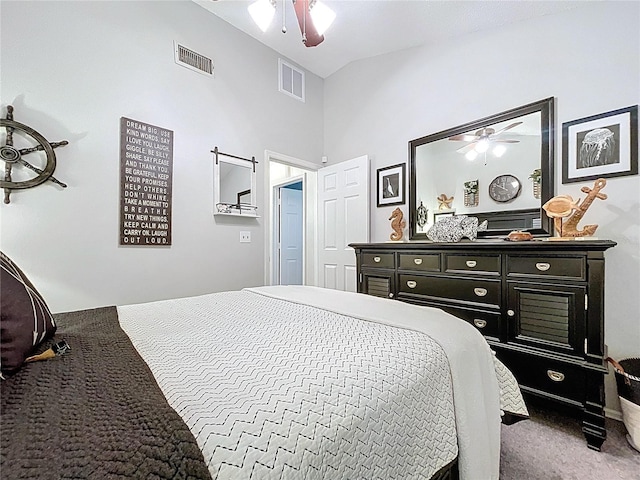 1445 Stonehenge Way, Palm Harbor, FL 34683 - bedroom with vaulted ceiling, carpet floors, and ceiling fan