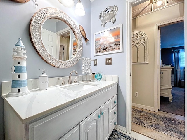 1445 Stonehenge Way, Palm Harbor, FL 34683 - bathroom with vanity and baseboards