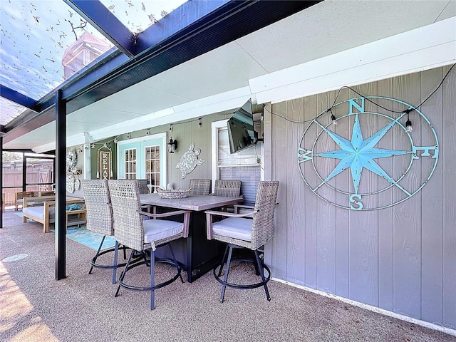 1445 Stonehenge Way, Palm Harbor, FL 34683 - view of patio / terrace with outdoor dining space