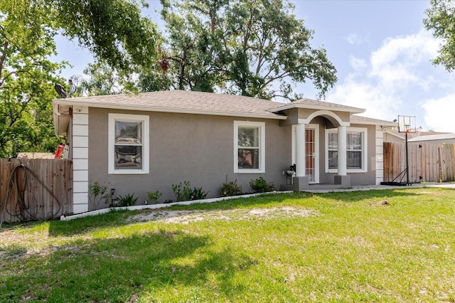 8517 N Branch Ave, Tampa, FL 33604 - single story home with stucco siding and roof with shingles