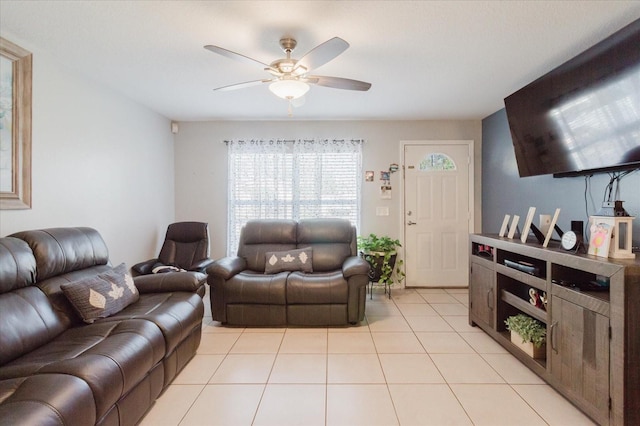 8517 N Branch Ave, Tampa, FL 33604 - living room featuring ceiling fan and light tile patterned flooring