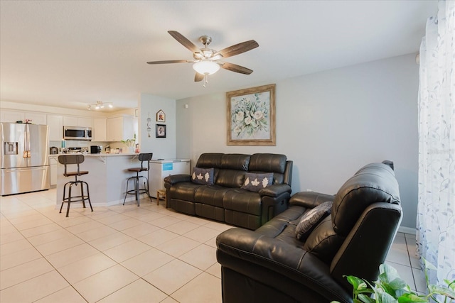 8517 N Branch Ave, Tampa, FL 33604 - living area featuring light tile patterned flooring and ceiling fan