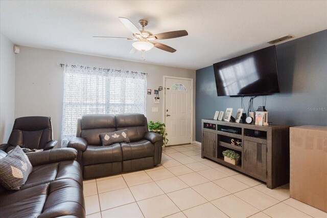 8517 N Branch Ave, Tampa, FL 33604 - living area featuring ceiling fan and light tile patterned floors