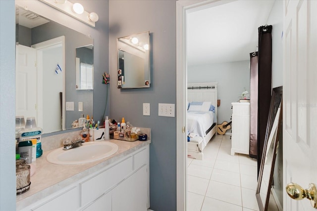 8517 N Branch Ave, Tampa, FL 33604 - ensuite bathroom featuring vanity and tile patterned flooring