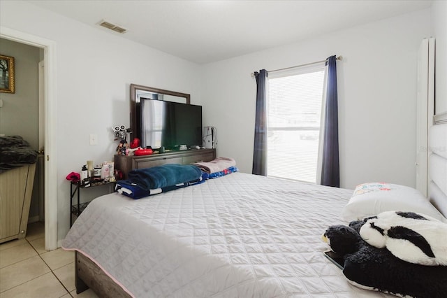 8517 N Branch Ave, Tampa, FL 33604 - bedroom featuring light tile patterned flooring