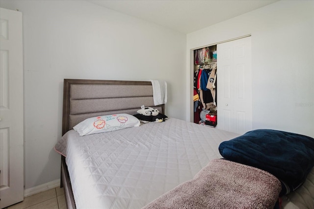 8517 N Branch Ave, Tampa, FL 33604 - bedroom featuring a closet, tile patterned flooring, and baseboards