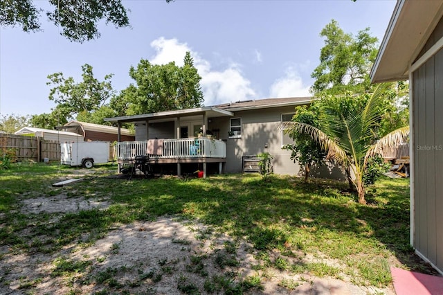 8517 N Branch Ave, Tampa, FL 33604 - back of property with a deck