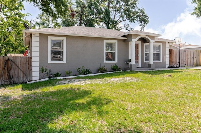 8517 N Branch Ave, Tampa, FL 33604 - ranch-style house featuring stucco siding and a shingled roof