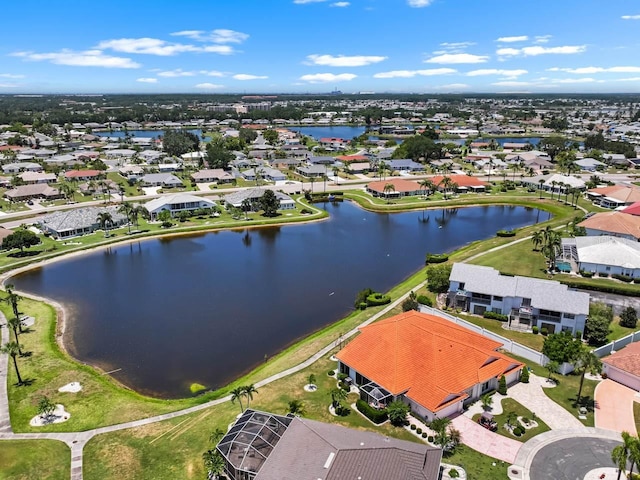 609 Lively Dr Unit B, Sun City Center, FL 33573 - aerial perspective of suburban area with a nearby body of water