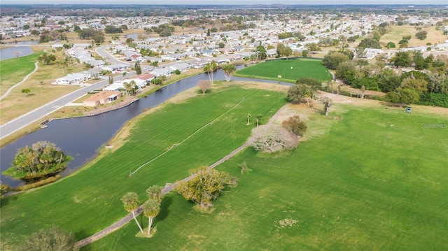 609 Lively Dr Unit B, Sun City Center, FL 33573 - aerial overview of property's location with nearby suburban area, a nearby body of water, and a golf course