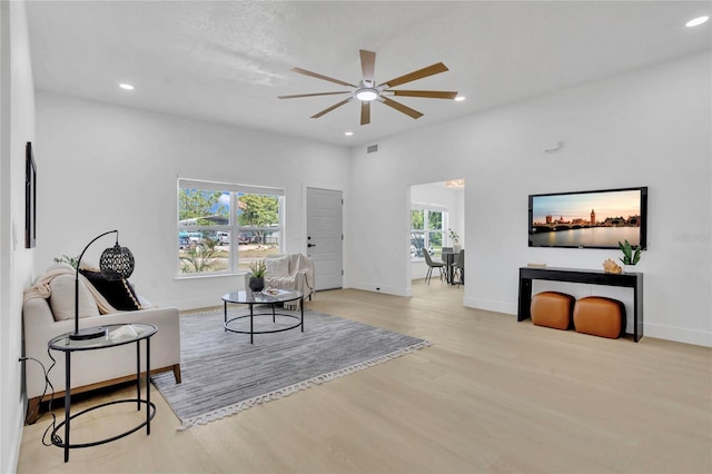 323 48th St NW, Bradenton, FL 34209 - living area featuring a ceiling fan, wood finished floors, recessed lighting, and baseboards