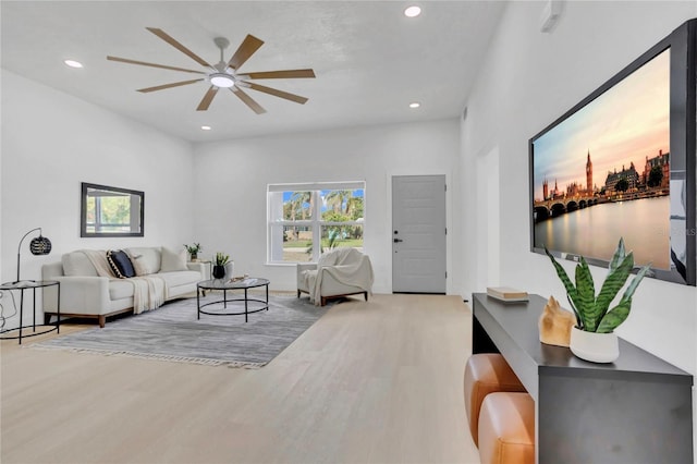 323 48th St NW, Bradenton, FL 34209 - living room featuring ceiling fan, healthy amount of natural light, recessed lighting, and wood finished floors