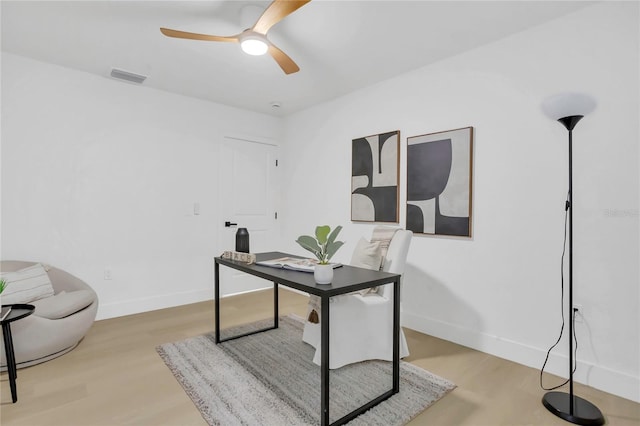 323 48th St NW, Bradenton, FL 34209 - office with ceiling fan, light wood-style flooring, and baseboards