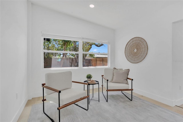 323 48th St NW, Bradenton, FL 34209 - sitting room with baseboards and light wood-type flooring