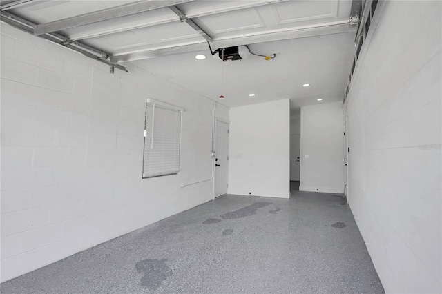 323 48th St NW, Bradenton, FL 34209 - garage with recessed lighting and concrete block wall