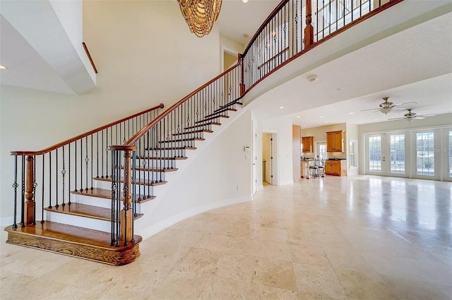 803 Harbor Dr, Belleair Beach, FL 33786 - stairway with a high ceiling, baseboards, ceiling fan, and recessed lighting