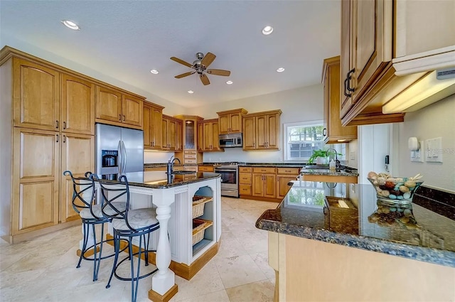 803 Harbor Dr, Belleair Beach, FL 33786 - kitchen with stainless steel appliances, open shelves, dark stone countertops, a ceiling fan, and a breakfast bar