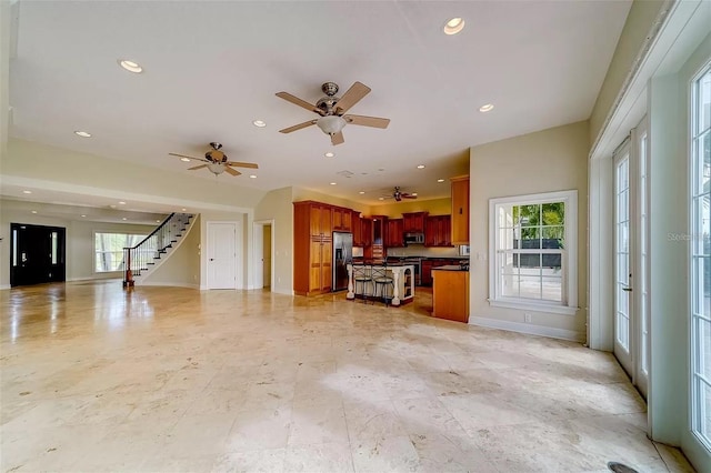 803 Harbor Dr, Belleair Beach, FL 33786 - unfurnished living room with baseboards, recessed lighting, stairs, and a ceiling fan