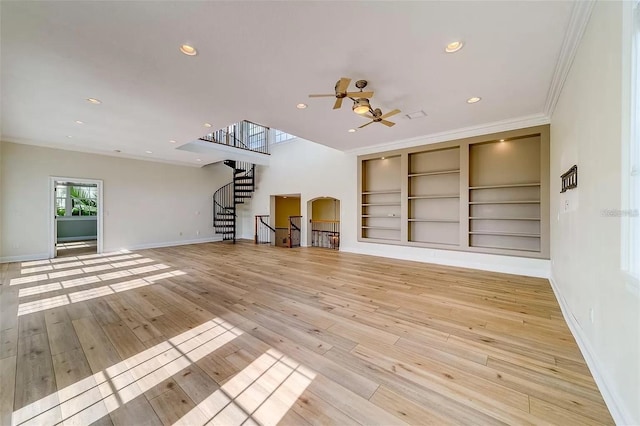 803 Harbor Dr, Belleair Beach, FL 33786 - unfurnished living room featuring a ceiling fan, light wood-style floors, baseboards, ornamental molding, and recessed lighting