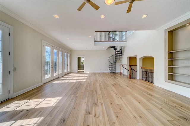 803 Harbor Dr, Belleair Beach, FL 33786 - unfurnished living room featuring ceiling fan, built in features, light wood-type flooring, ornamental molding, and recessed lighting