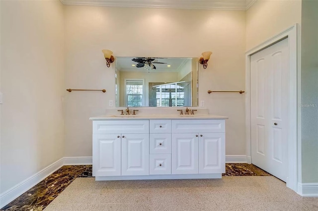 803 Harbor Dr, Belleair Beach, FL 33786 - bathroom with crown molding, a shower stall, double vanity, baseboards, and carpet