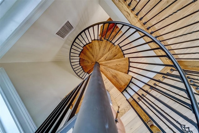 803 Harbor Dr, Belleair Beach, FL 33786 - staircase with wood finished floors