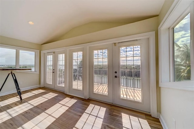 803 Harbor Dr, Belleair Beach, FL 33786 - unfurnished sunroom featuring french doors and lofted ceiling