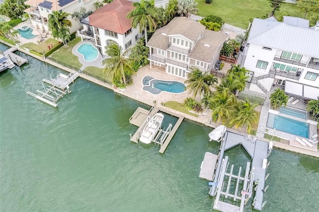 803 Harbor Dr, Belleair Beach, FL 33786 - drone / aerial view of a pool and a large body of water