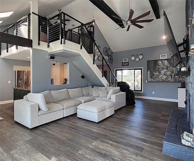 1608 20th Ave W, Palmetto, FL 34221 - living area with high vaulted ceiling, ceiling fan, stairs, baseboards, and wood finished floors