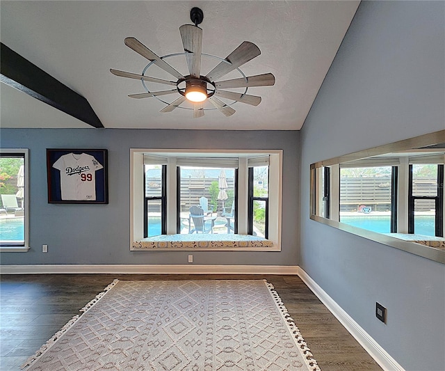 1608 20th Ave W, Palmetto, FL 34221 - empty room with lofted ceiling, dark wood-style flooring, baseboards, and ceiling fan