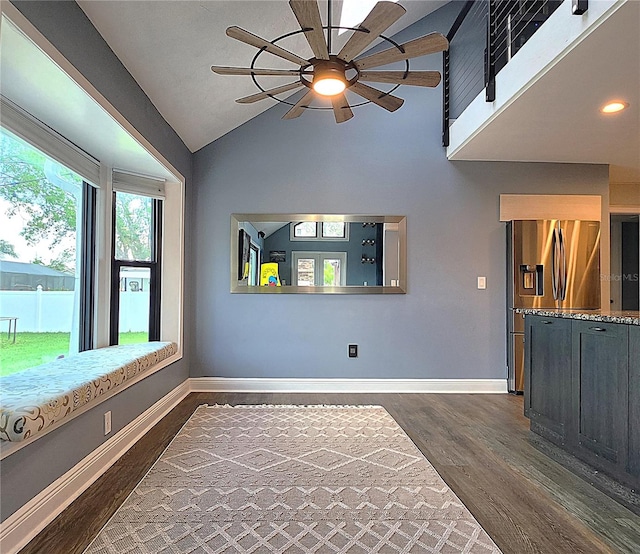 1608 20th Ave W, Palmetto, FL 34221 - unfurnished living room with dark wood-style floors, ceiling fan, baseboards, vaulted ceiling, and recessed lighting