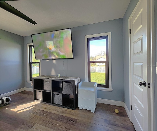 1608 20th Ave W, Palmetto, FL 34221 - interior space featuring wood finished floors and baseboards