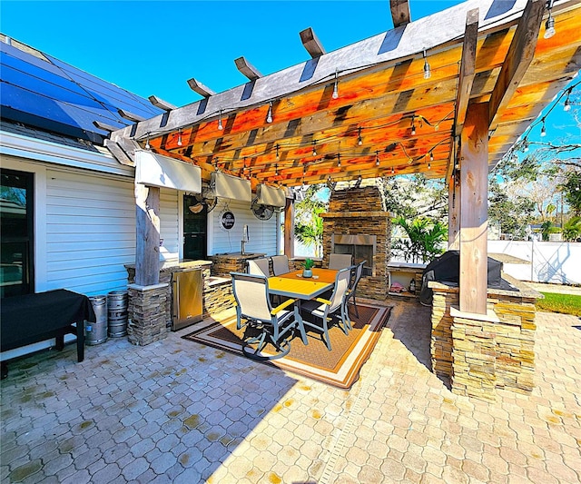 1608 20th Ave W, Palmetto, FL 34221 - view of patio / terrace featuring outdoor dining space and an outdoor stone fireplace